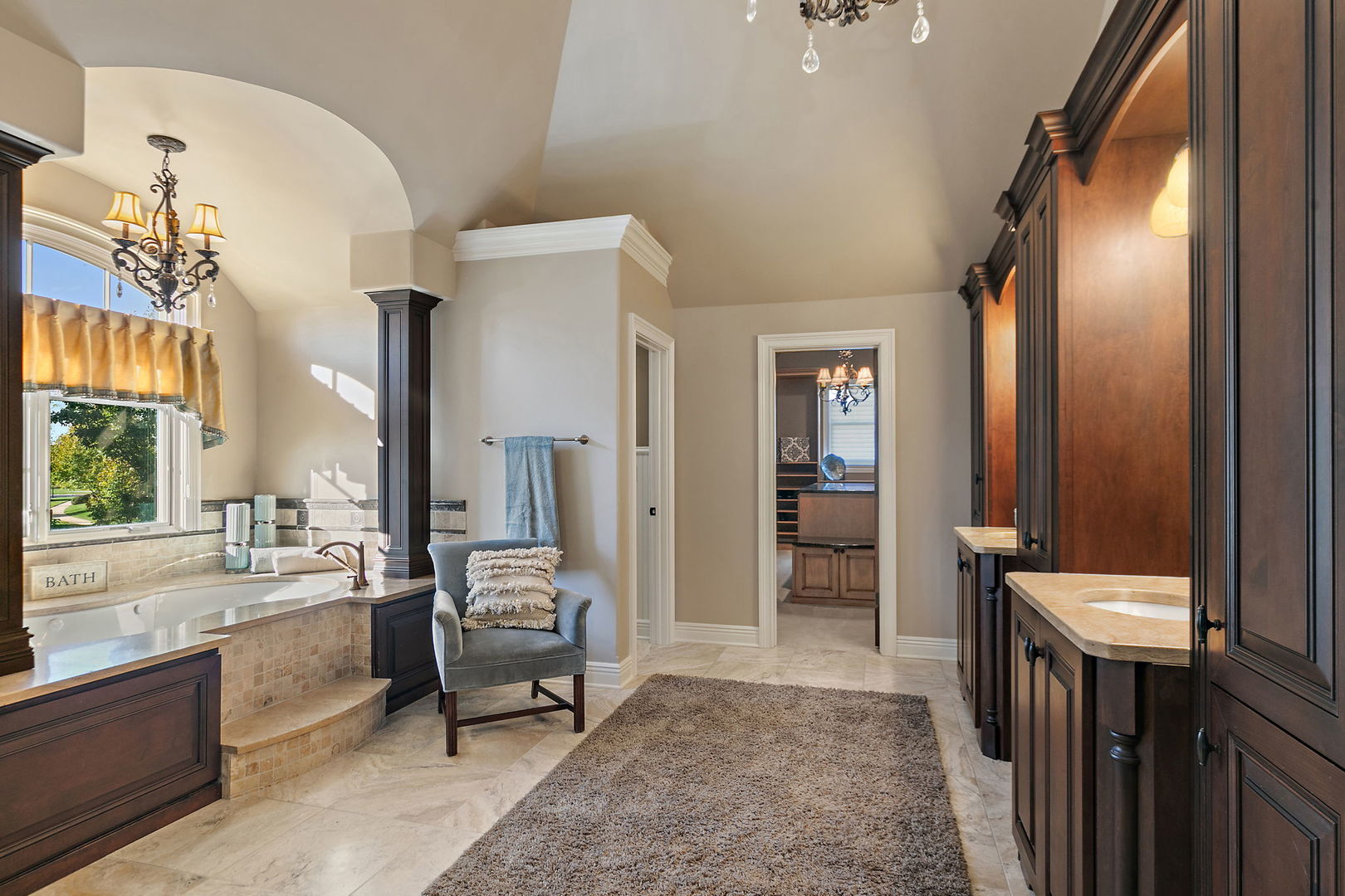 3660 Broadleaf Avenue Elgin, IL 60124 - Photo 41 of 84 a living room with furniture and a large mirror next to a window
