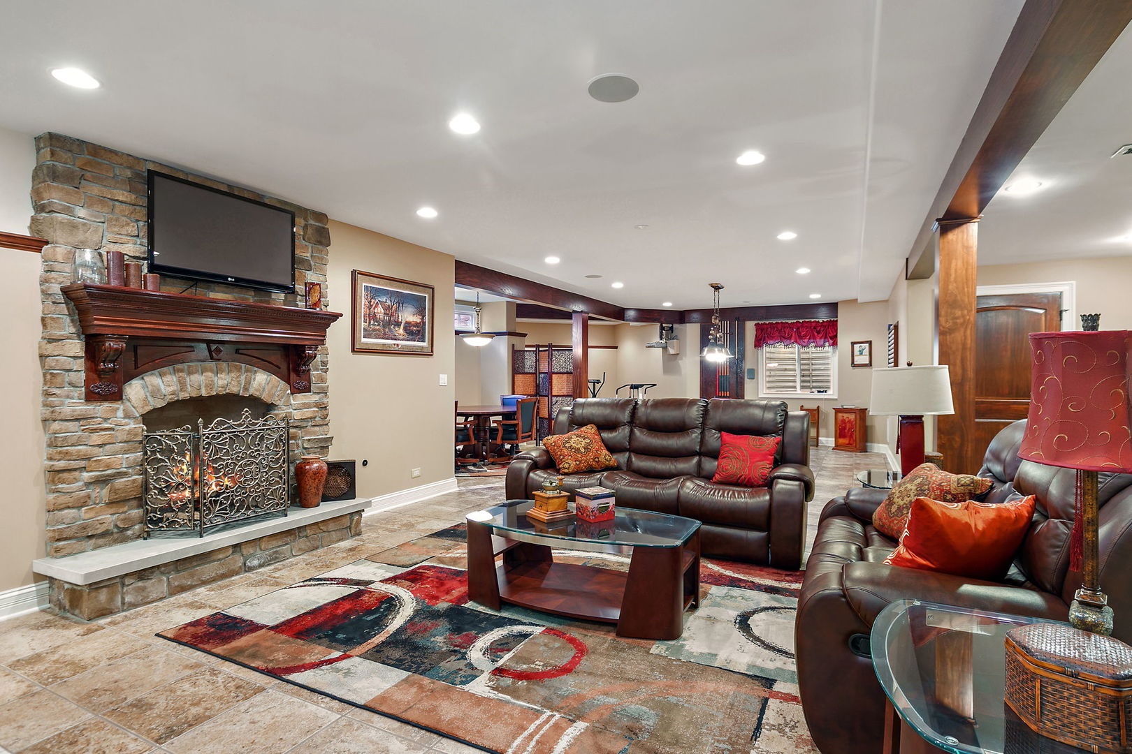 3660 Broadleaf Avenue Elgin, IL 60124 - Photo 48 of 84 a living room with furniture and a fireplace