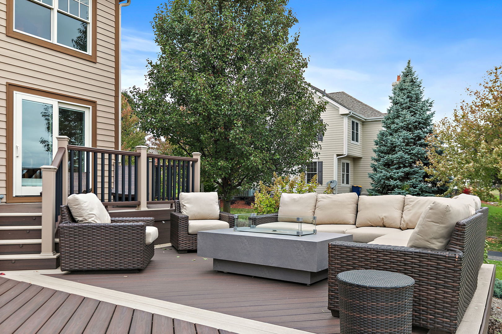 3660 Broadleaf Avenue Elgin, IL 60124 - Photo 57 of 84 a view of a patio with couches chairs and wooden floor