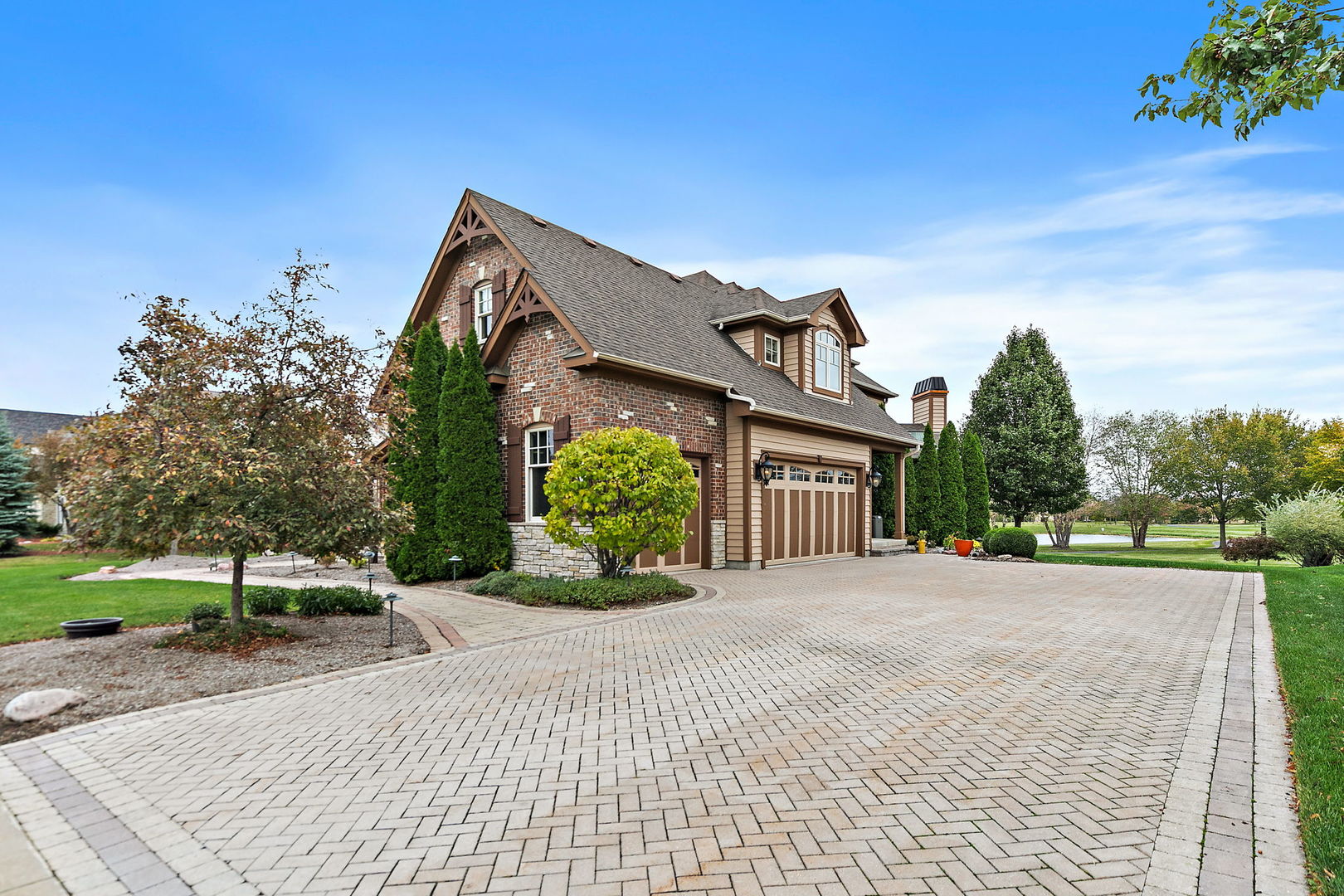 3660 Broadleaf Avenue Elgin, IL 60124 - Photo 68 of 84 a front view of a house with a yard and garage
