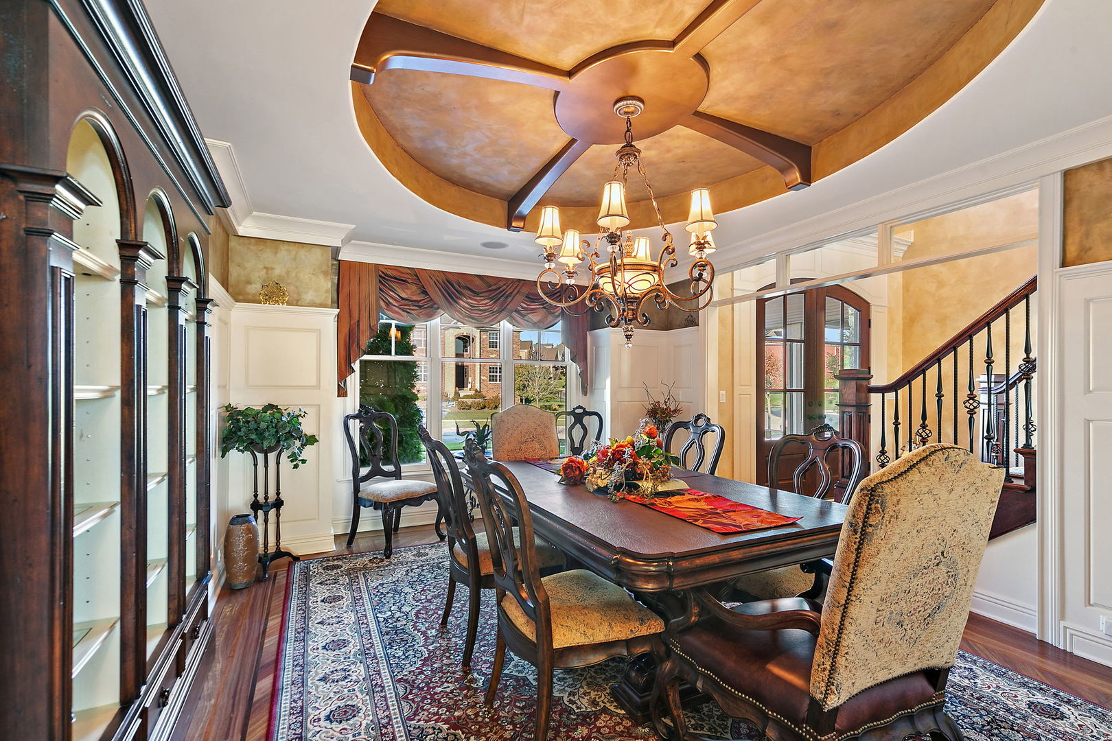 3660 Broadleaf Avenue Elgin, IL 60124 - Photo 8 of 84 a view of a dining room with furniture a chandelier and wooden floor
