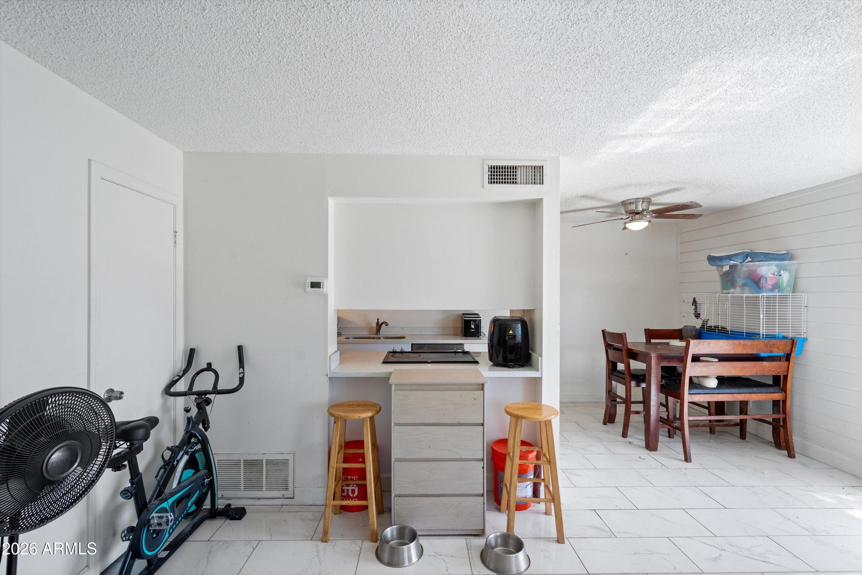 600 South Dobson Road, Unit 88 Mesa, AZ 85202 - Photo 10 of 18 a view of a workspace with furniture