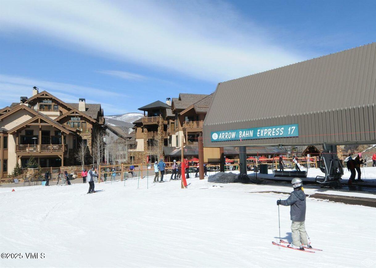 160 Cresta Road, Unit R202 Edwards, CO 81632 - Photo 14 of 25 a view of tall building with cars parked