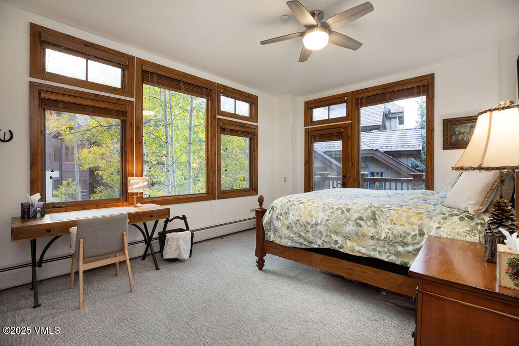 160 Cresta Road, Unit R202 Edwards, CO 81632 - Photo 7 of 25 a bed sitting in a spacious bedroom next to a window