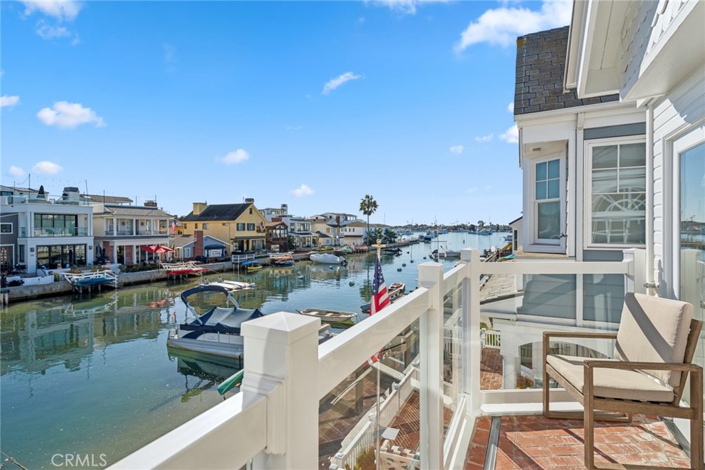 125 Grand Canal Newport Beach, CA 92662 - Photo 22 of 41 a view of a lake with a terrace