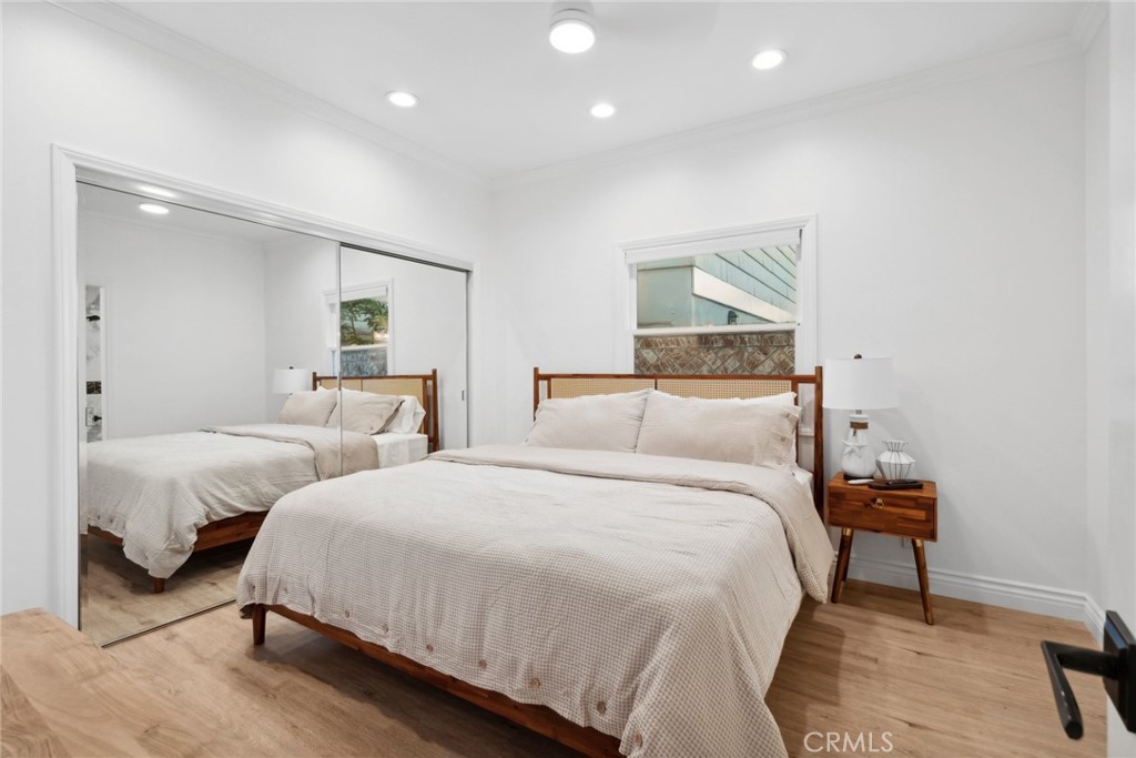 125 Grand Canal Newport Beach, CA 92662 - Photo 31 of 41 a bedroom with two beds and painting on the wall