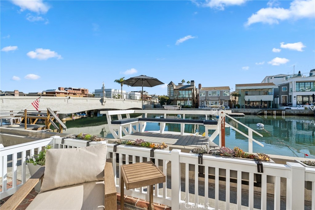 125 Grand Canal Newport Beach, CA 92662 - Photo 36 of 41 a view of a balcony with chairs