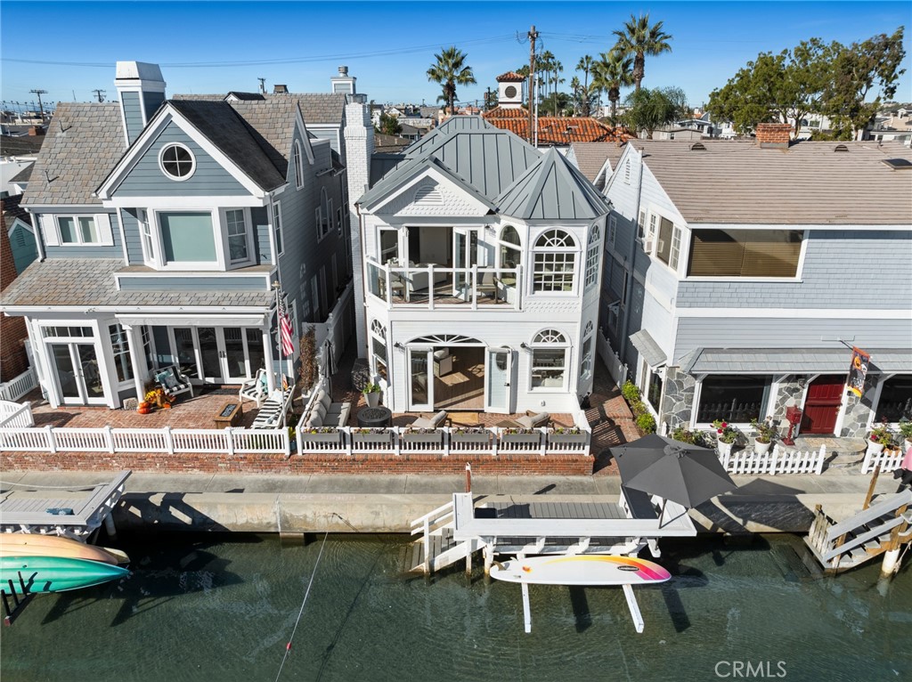 125 Grand Canal Newport Beach, CA 92662 - Photo 39 of 41 a aerial view of a house with swimming pool and porch