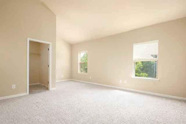 an empty room with windows