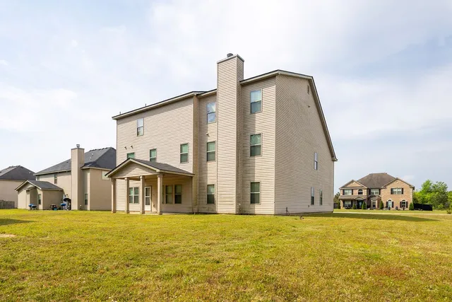 a front view of house with an ocean view