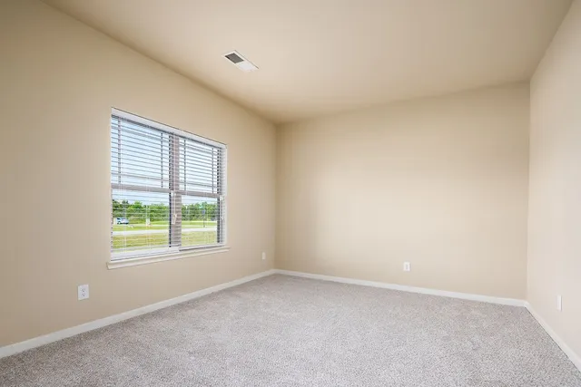 an empty room with a window