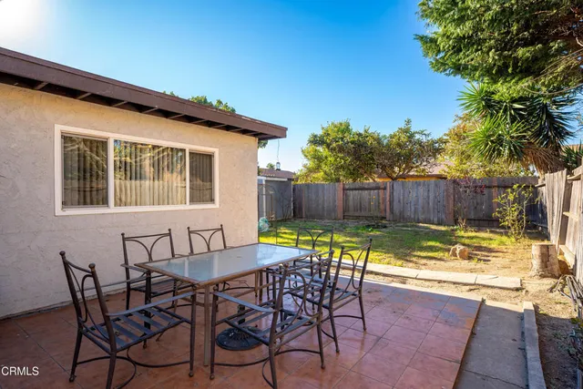 a view of swimming pool with outdoor seating