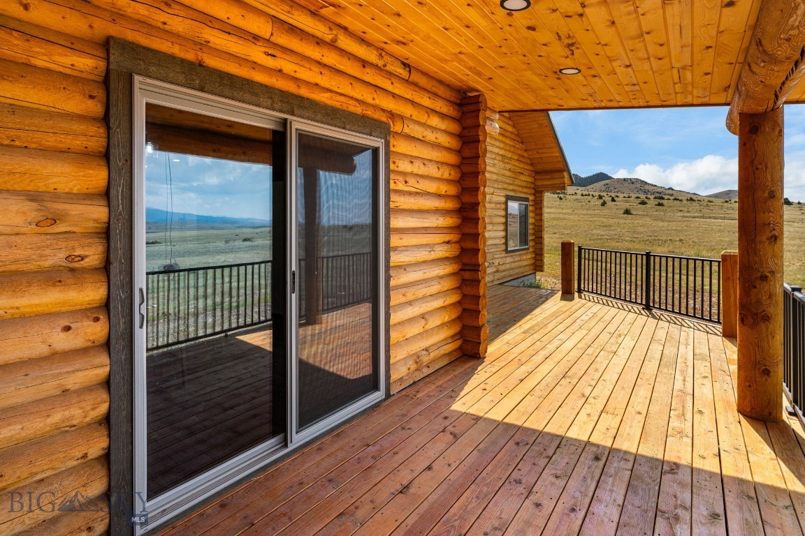 160 Wapiti Road Whitehall, MT 59759 - Photo 48 of 57 Back deck with sliding glass door