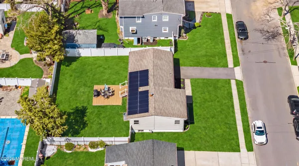 an aerial view of a house with a garden