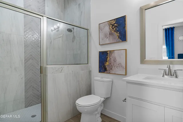 a bedroom with bed and window