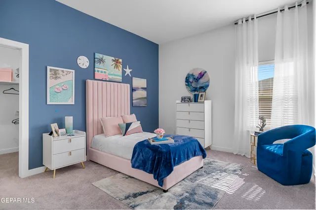 a bathroom with a bathtub shower vanity and sink