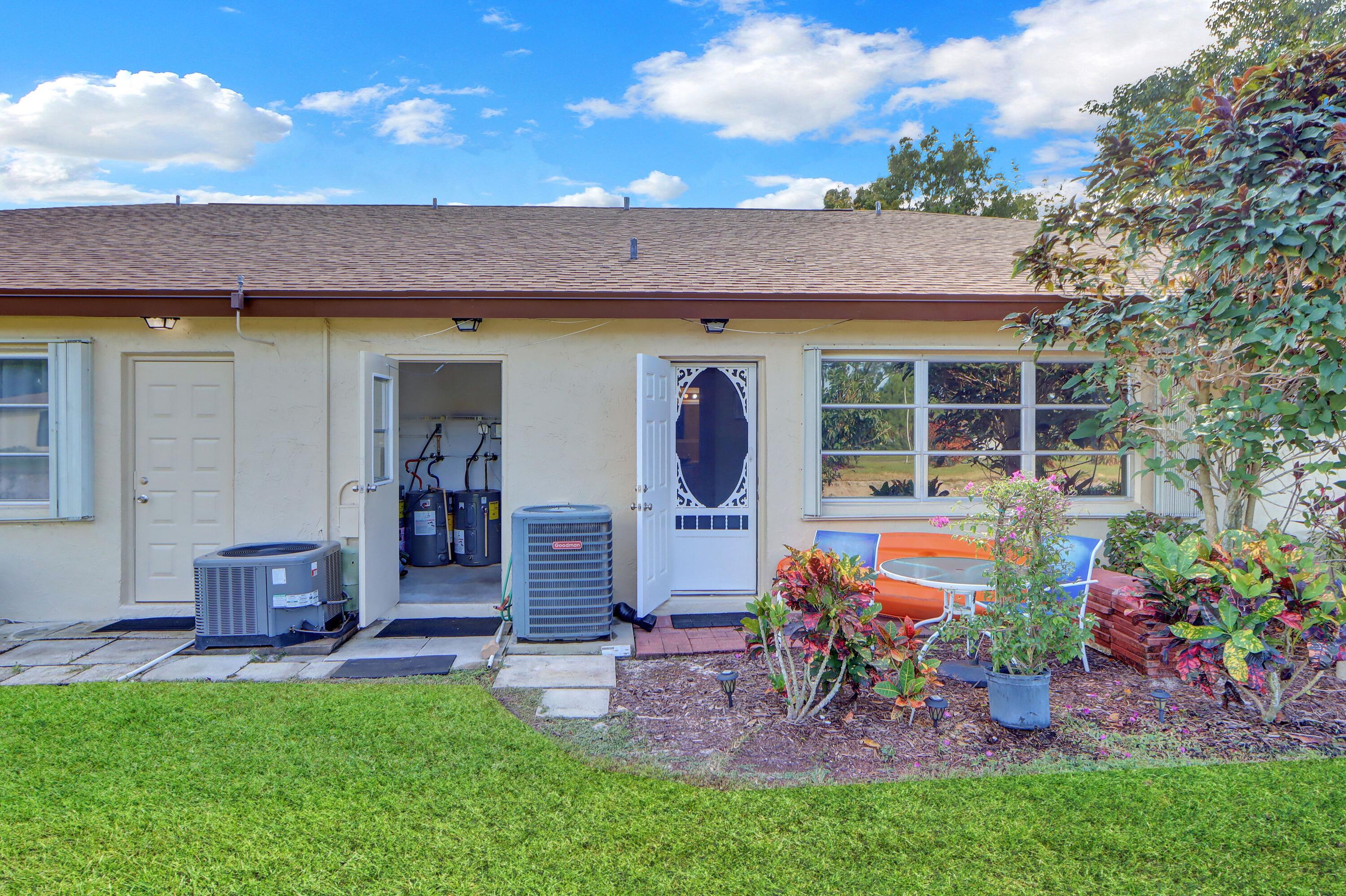 14050 Nesting Way, Unit B Delray Beach, FL 33484 - Photo 15 of 18 Rear Patio