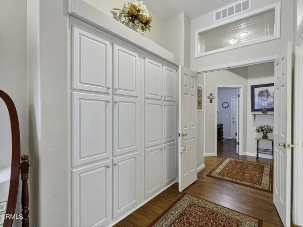 a bathroom with a glass door shower
