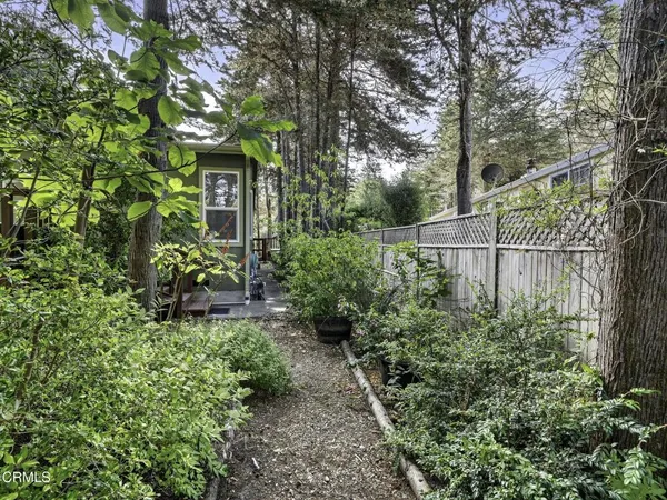 a garden view with a seating space