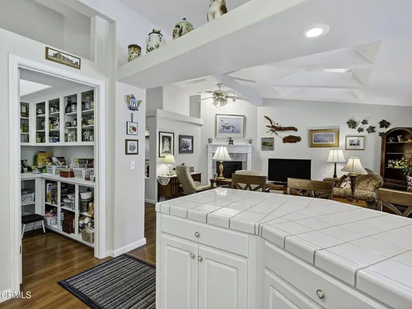 a view of living room with furniture and flat screen tv