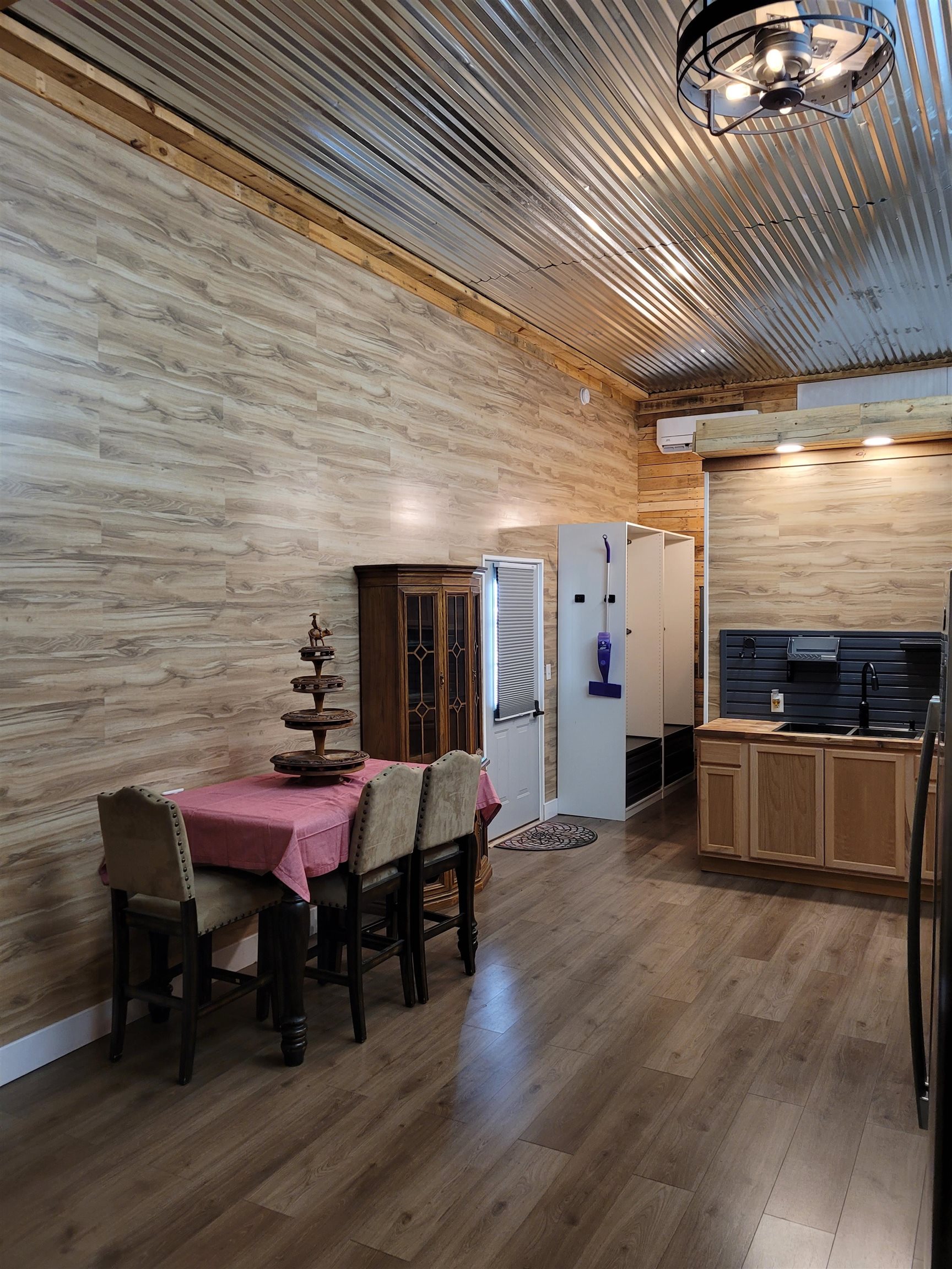 4186 Marvin Chapel Road Brownsville, TN 38012 - Photo 13 of 37 a dining room with furniture and wooden floor