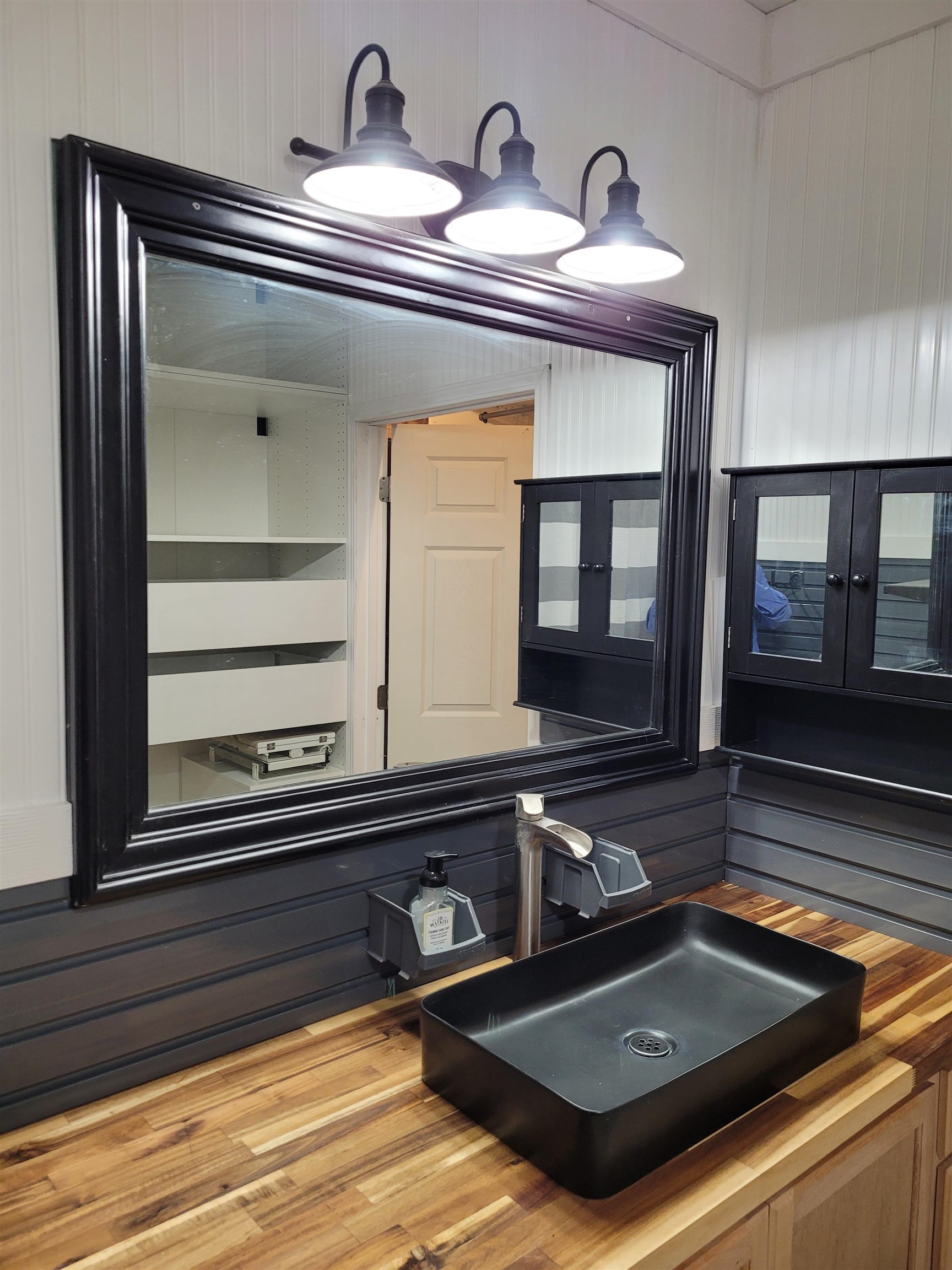 4186 Marvin Chapel Road Brownsville, TN 38012 - Photo 16 of 37 a bathroom with a sink and a mirror