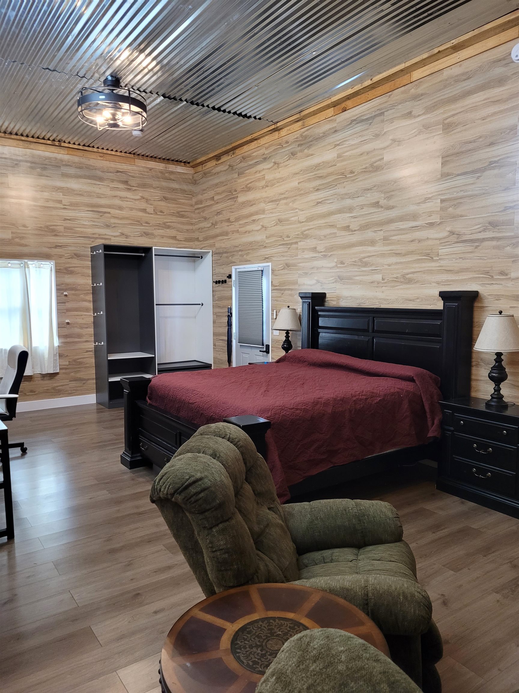 4186 Marvin Chapel Road Brownsville, TN 38012 - Photo 4 of 37 a bedroom with a bed and wooden floor