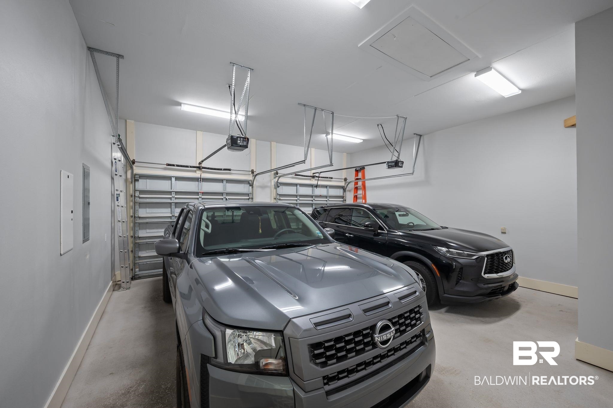 905 Buttercup Lane Foley, AL 36535 - Photo 38 of 47 Garage with a garage door opener