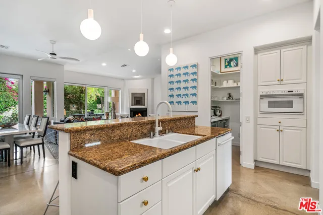 a view of cabinets and window