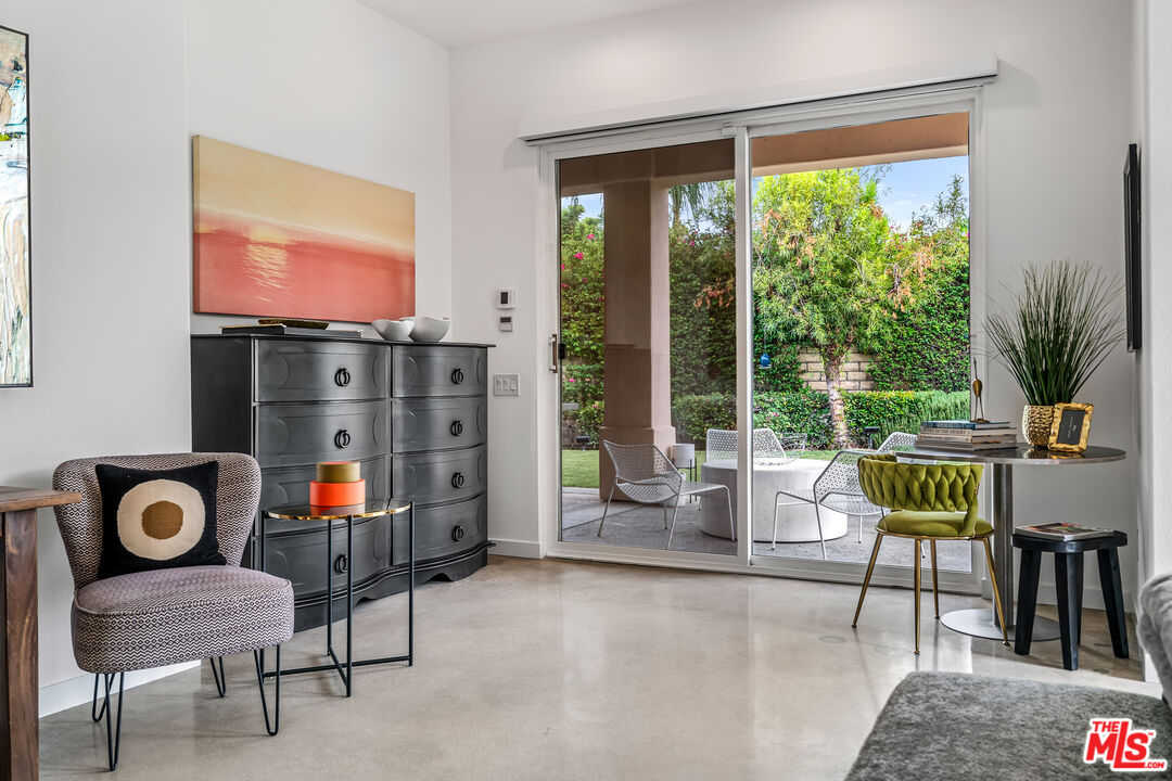 2788 Princess Lane Palm Springs, CA 92264 - Photo 32 of 67 a living room with furniture and a flat screen tv
