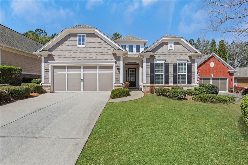 6036 Sharp Top Circle Hoschton, GA 30548 - Photo 1 of 1 a front view of a house with a yard
