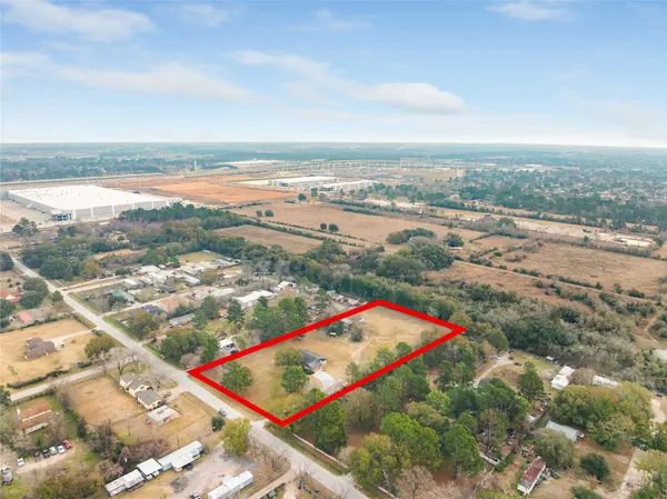 an aerial view of beach and ocean