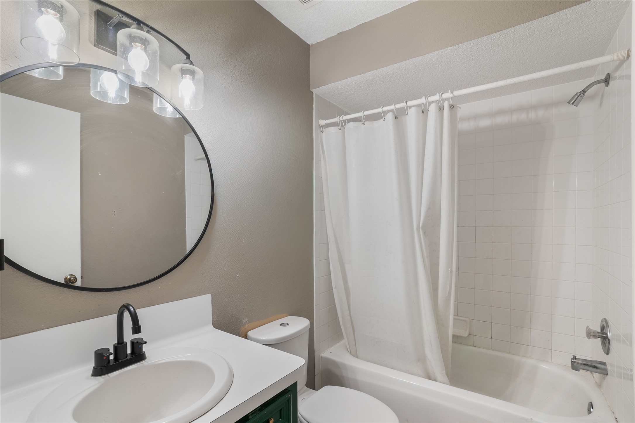 18914 Hamish Road Tomball, TX 77377 - Photo 26 of 39 a bathroom with a sink toilet and shower