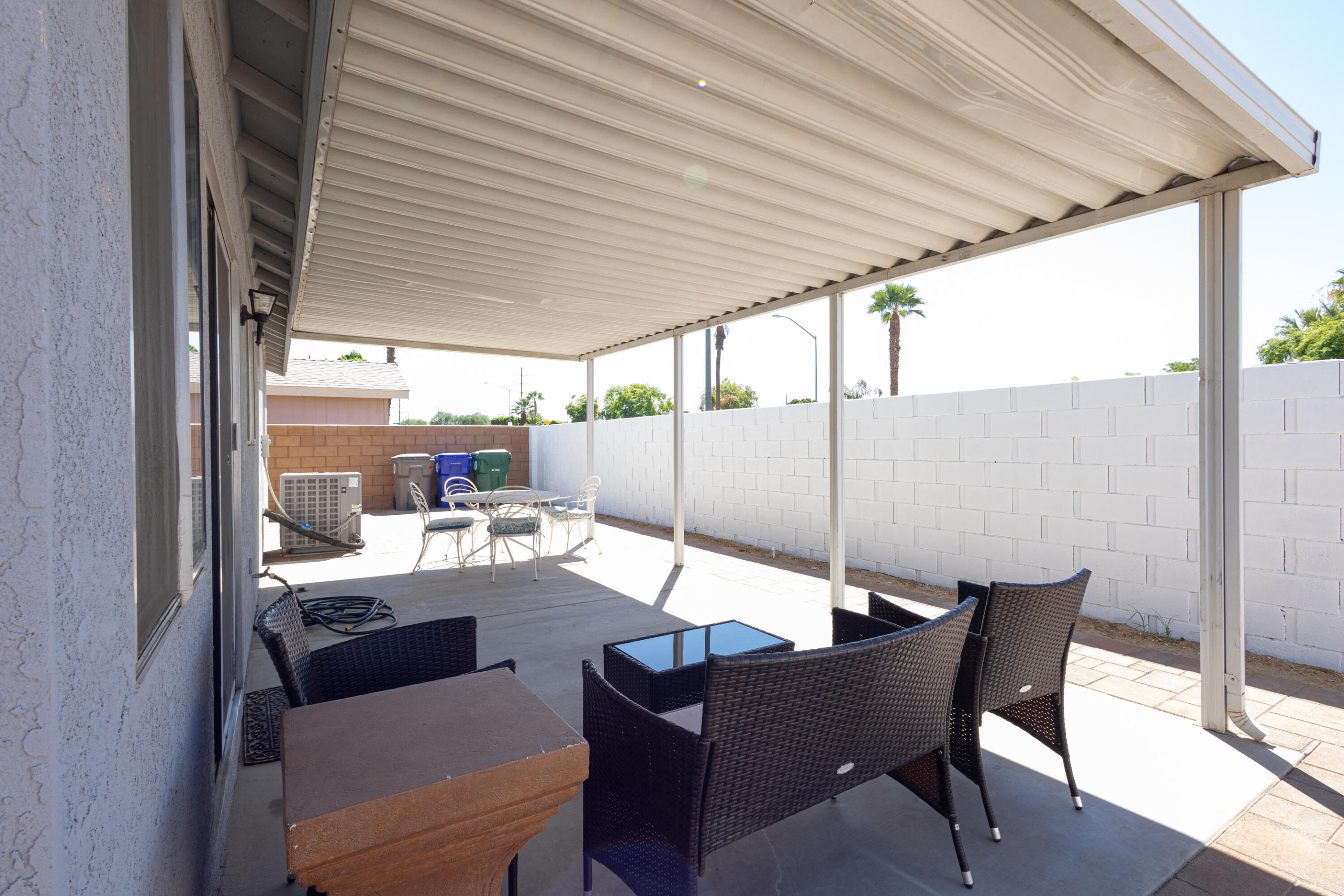 47800 Madison Street, Unit 37 Indio, CA 92201 - Photo 12 of 15 a outdoor space with a table and chairs