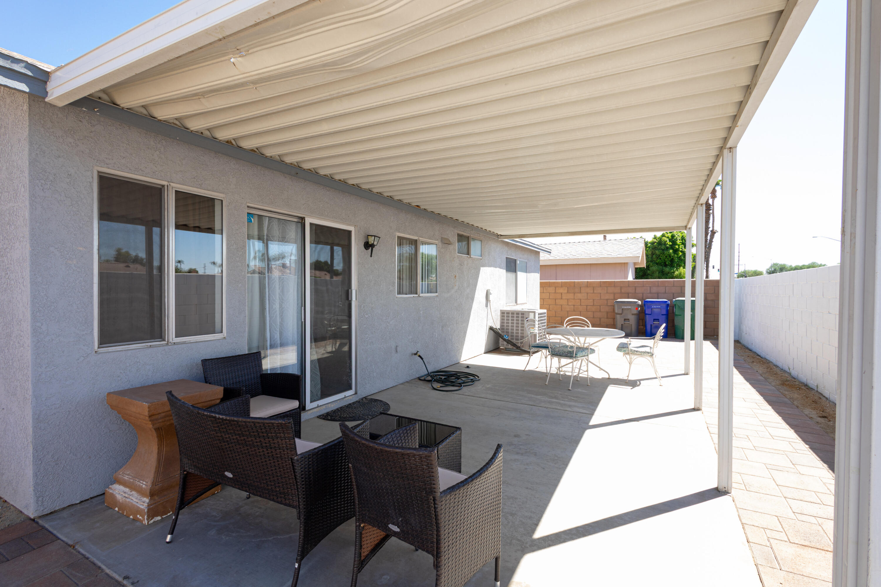 47800 Madison Street, Unit 37 Indio, CA 92201 - Photo 15 of 15 a workspace with furniture and window