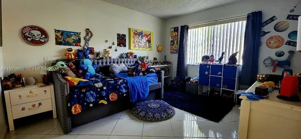 a bed room with furniture and decor