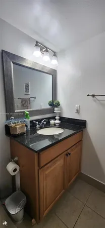 a bathroom with a sink and a toilet
