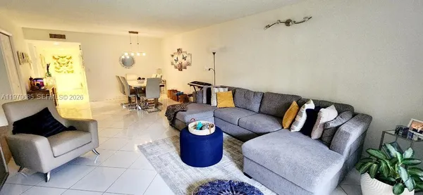 a living room with furniture and a couch