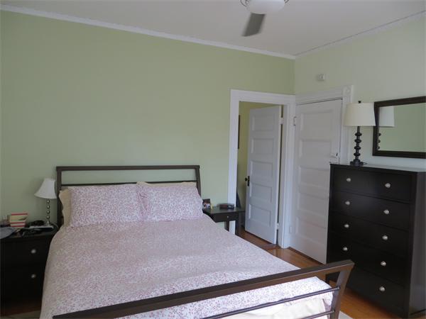 11 Hurd Road, Unit 2 Brookline, MA 02445 - Photo 11 of 18 a bedroom with a bed and a dresser