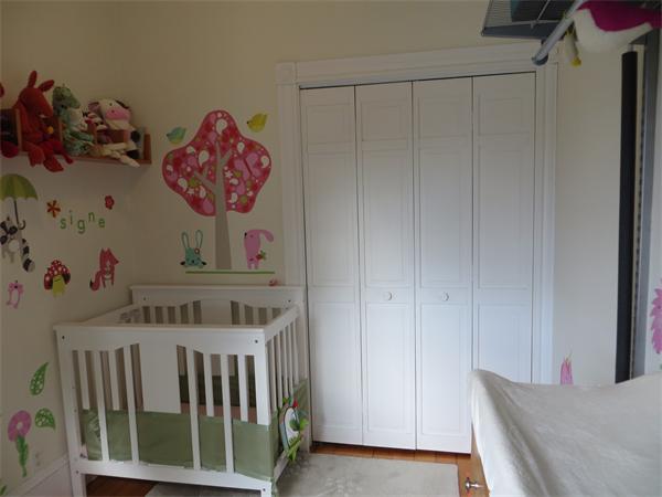 11 Hurd Road, Unit 2 Brookline, MA 02445 - Photo 12 of 18 a view of a room that has a table and a chair in it