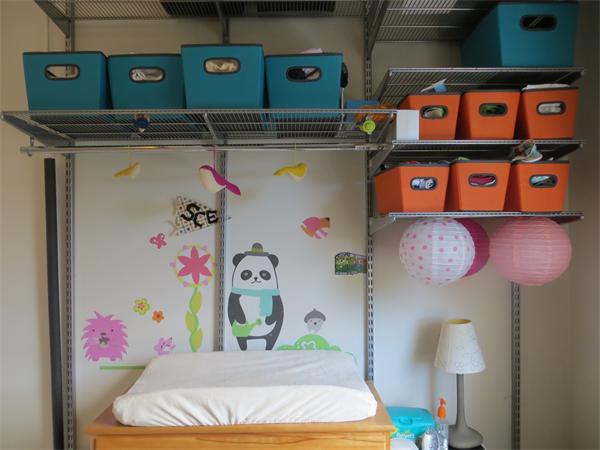 11 Hurd Road, Unit 2 Brookline, MA 02445 - Photo 13 of 18 a utility room with dryer and baby on a table