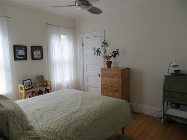 11 Hurd Road, Unit 2 Brookline, MA 02445 - Photo 14 of 18 a bedroom with a bed and a dresser