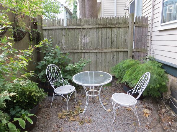 11 Hurd Road, Unit 2 Brookline, MA 02445 - Photo 17 of 18 a outdoor view with a seating space