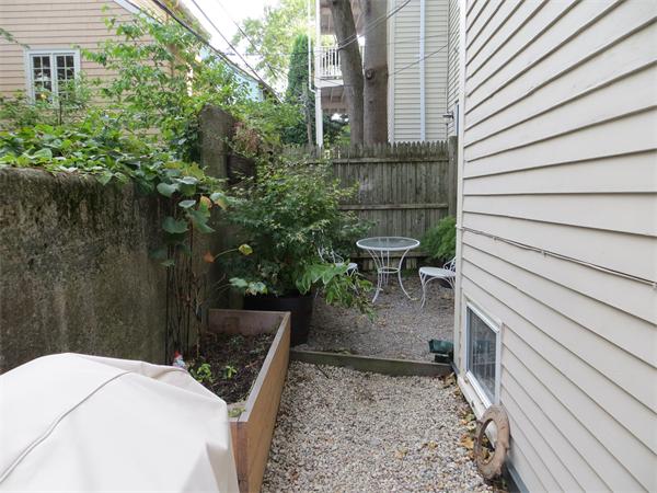 11 Hurd Road, Unit 2 Brookline, MA 02445 - Photo 18 of 18 a view of a patio in backyard