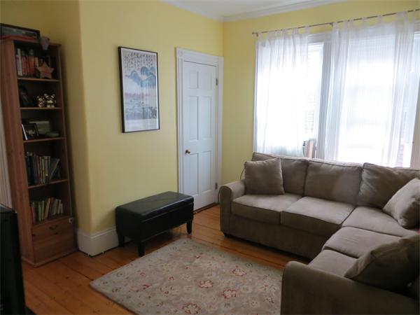 11 Hurd Road, Unit 2 Brookline, MA 02445 - Photo 5 of 18 a living room with furniture and a window