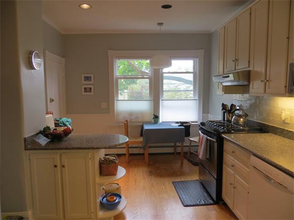 11 Hurd Road, Unit 2 Brookline, MA 02445 - Photo 8 of 18 a kitchen with sink refrigerator and window