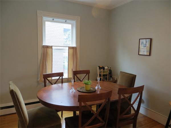11 Hurd Road, Unit 2 Brookline, MA 02445 - Photo 9 of 18 a view of a dining room with furniture and window
