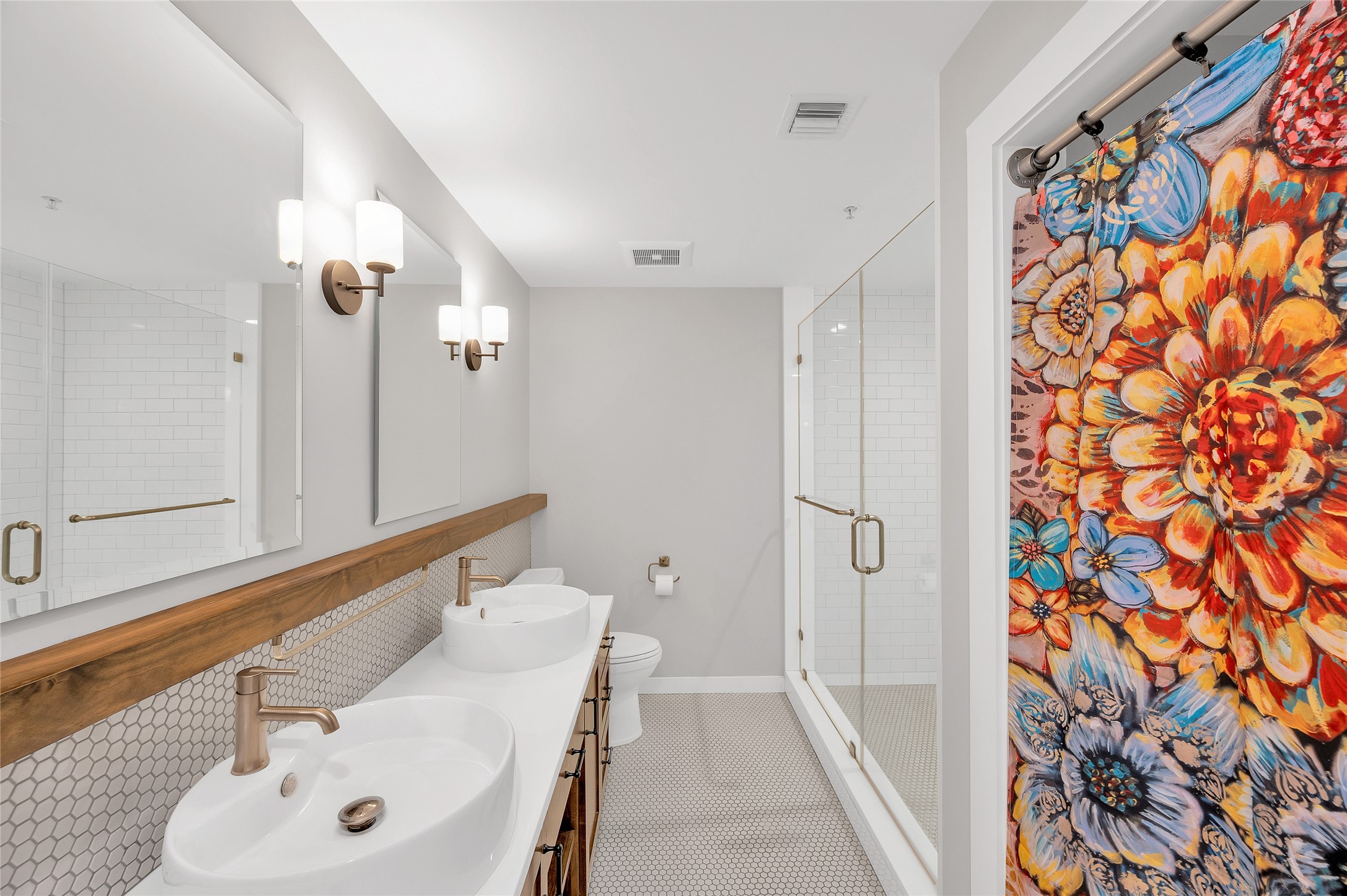 204 Travis Street, Unit 4A Houston, TX 77002 - Photo 15 of 34 a bathroom with a sink and a mirror