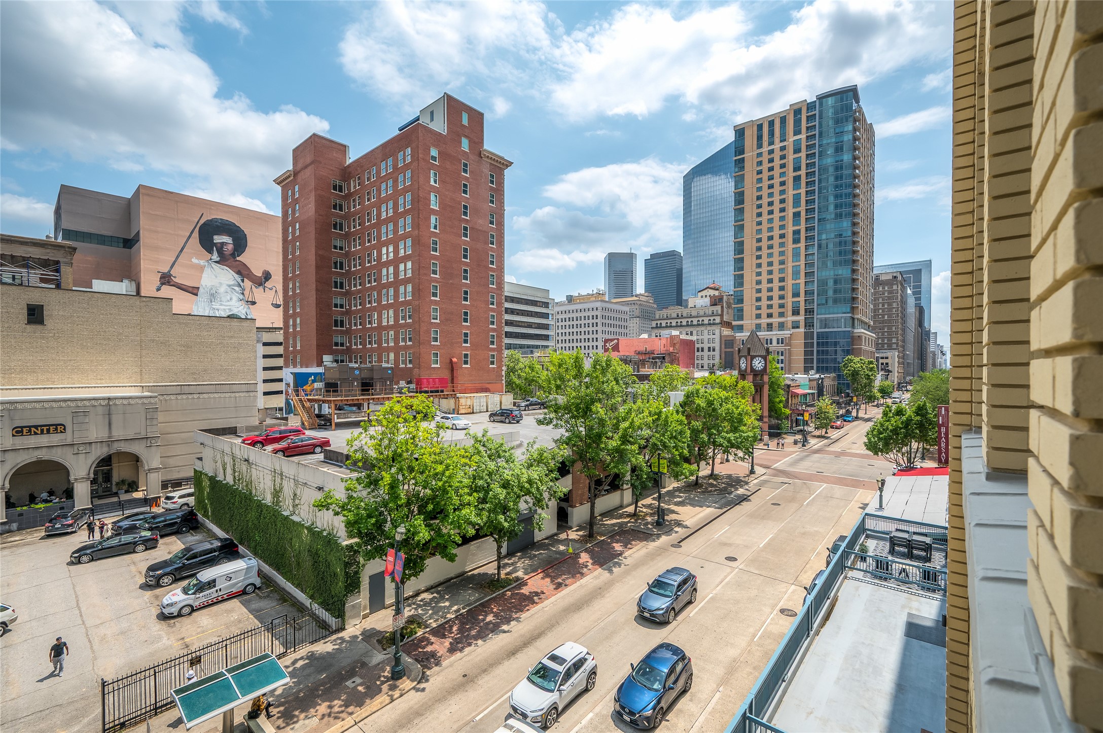 204 Travis Street, Unit 4A Houston, TX 77002 - Photo 21 of 34 a view of a city with tall buildings