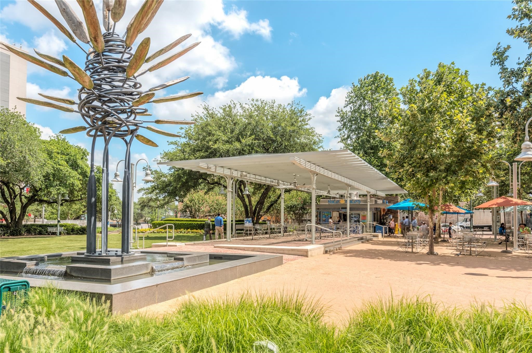 204 Travis Street, Unit 4A Houston, TX 77002 - Photo 22 of 34 a swimming pool with outdoor seating and yard